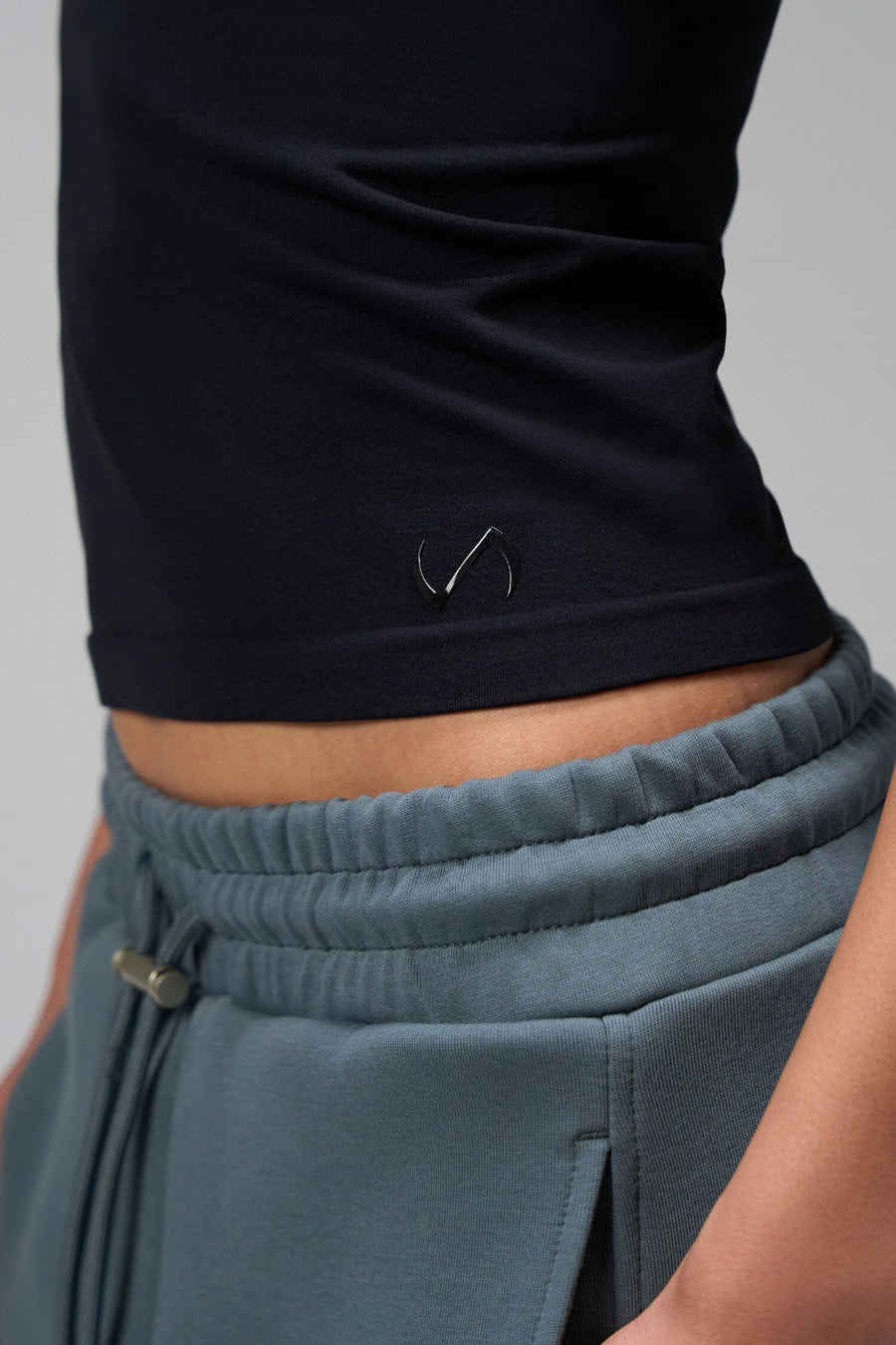 Side View Of Women's Essential Seamless T Shirt in Black