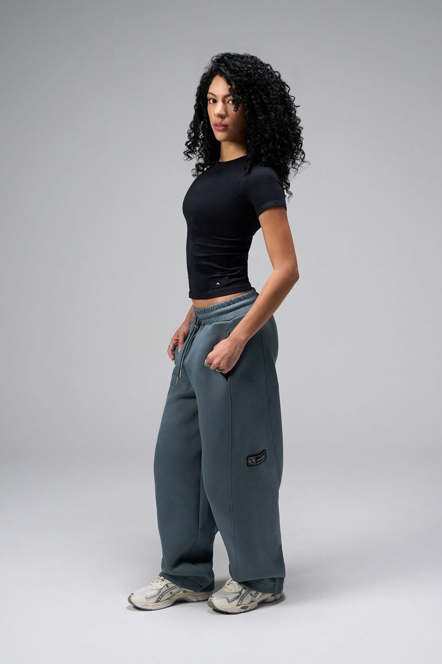 Side View Of Women's Essential Seamless T Shirt in Black