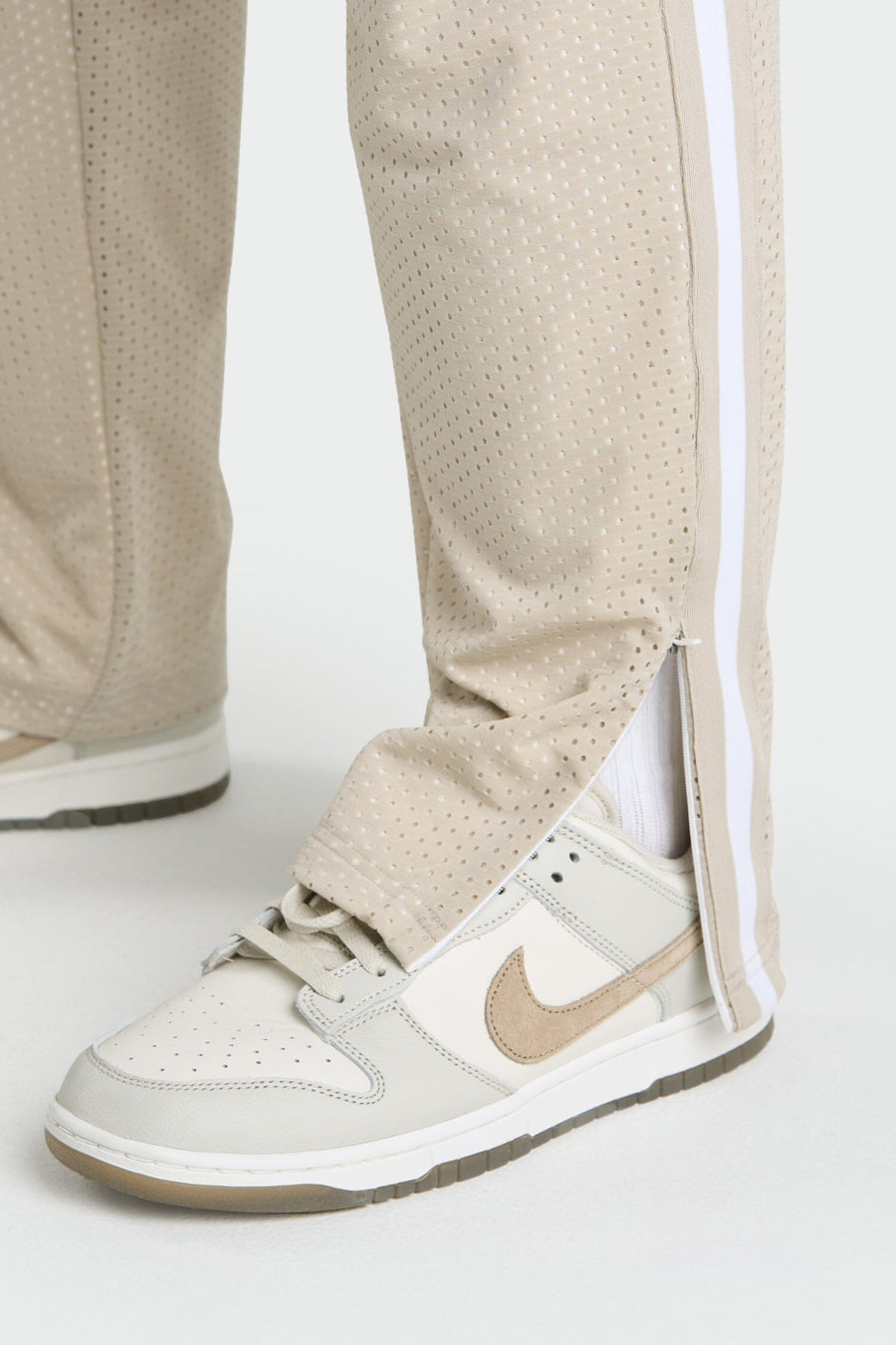 Front View of Sand Evolve Mesh Track Pants