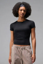 Front View of Black the TLF Fitted Crew Neck T-Shirt featuring a long line silhouette and whip stitch detailing. 