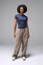 Front View of Blue the TLF Fitted Crew Neck T-Shirt featuring a long line silhouette and whip stitch detailing. 
