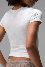 Back View of Gray the TLF Fitted Crew Neck T-Shirt featuring a long line silhouette and whip stitch detailing. 