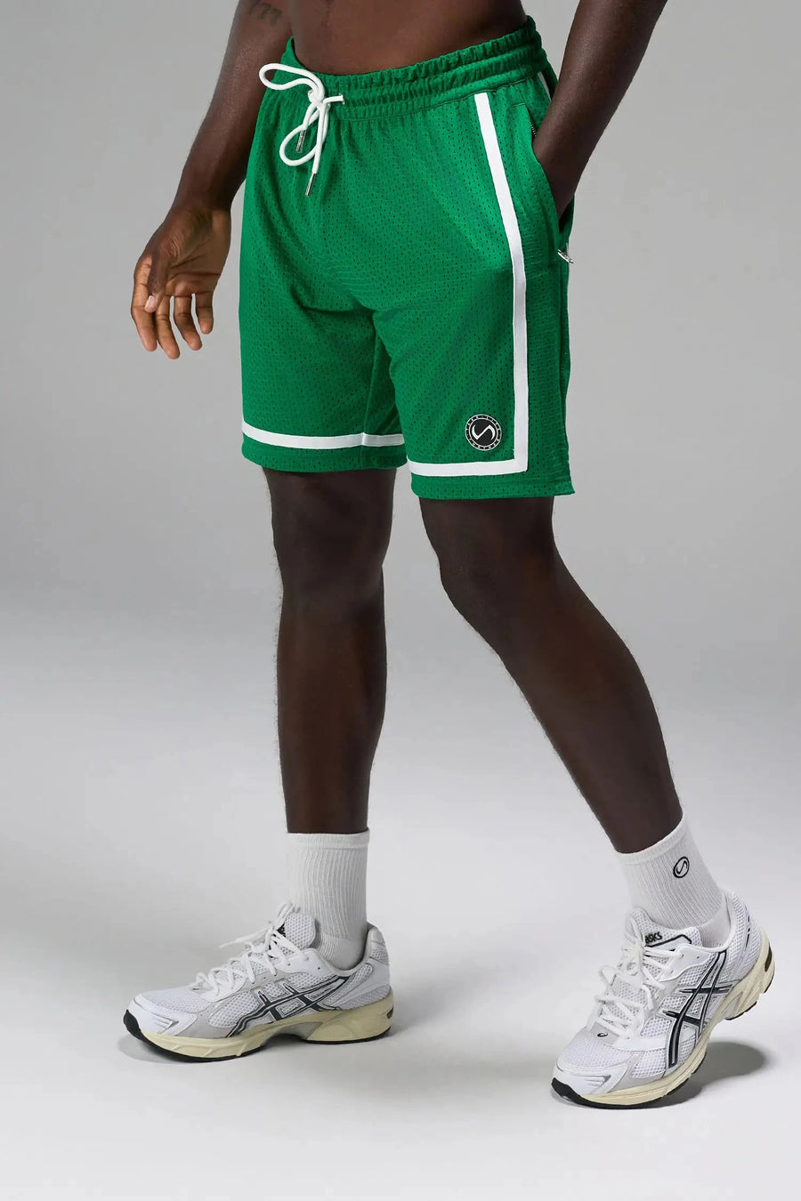 Front View of Green GTS Athletic 8 Inch Shorts, featuring an 8-inch inseam and zipper pockets