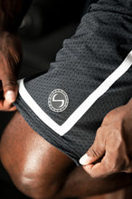 Detail View of Grey GTS Athletic 8 Inch Shorts, featuring an 8-inch inseam and zipper pockets