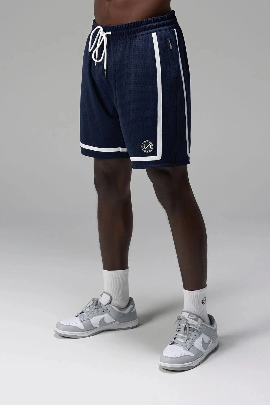 Front View of Blue GTS Athletic 8 Inch Shorts, featuring an 8-inch inseam and zipper pockets