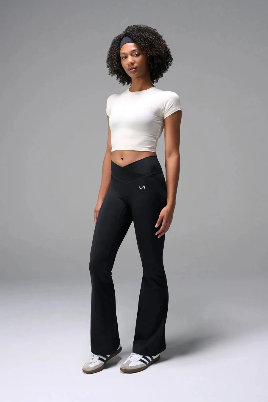 Front View of White the TLF GTS Cropped Baby Tee features sporty raglan sleeves, cropped length and premium whip stitch detailing. 