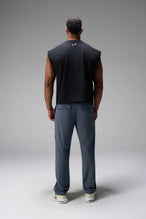 Back View of Blue the TLF GTS Element-Max Cargo Pants featuring front cargo pockets and an adjustable ankle drawcord ankle for custom fit