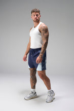 Front View of Blue the TLF GTS Element-Max Shorts featuring contrast color panels and sleek invisible side zipper pockets