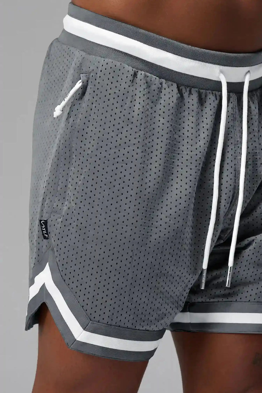 Detail Front View of Gray GTS Evolve Mesh 6 Inch Shorts, featuring dual side pockets and 6 inch inseam for performance and functionality 