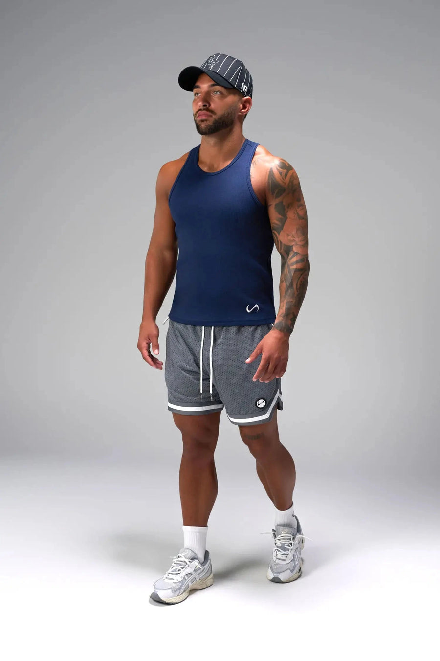 Front View of Gray GTS Evolve Mesh 6 Inch Shorts, featuring dual side pockets and 6 inch inseam for performance and functionality 