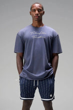 Front View of Blue GTS Evolve Mesh 8 Inch Shorts, featuring an 8-inch inseam, custom pinstripe design and zipper pockets