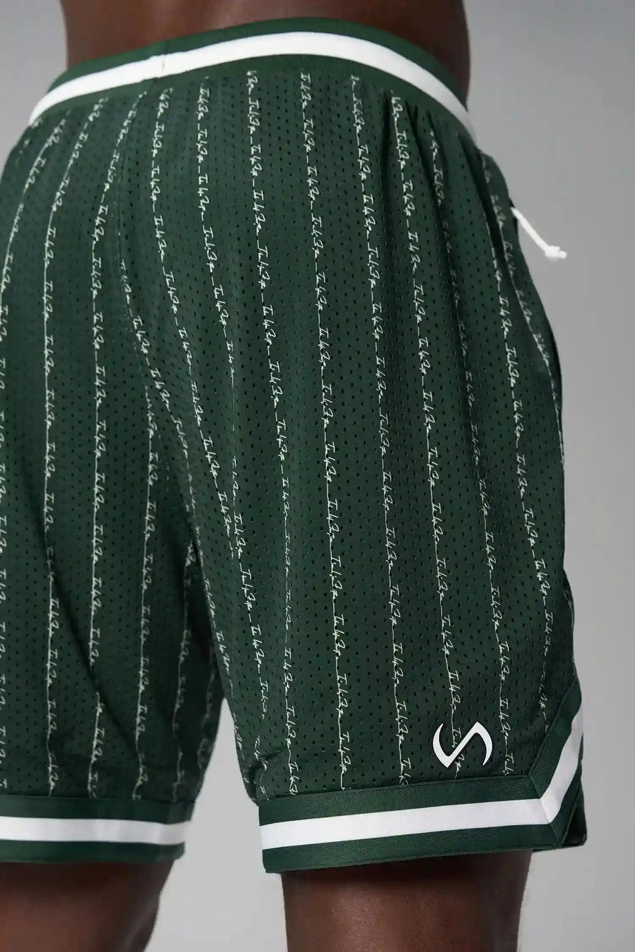 Back View of Green GTS Evolve Mesh 8 Inch Shorts, featuring an 8-inch inseam, custom pinstripe design and zipper pockets