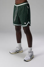 Front View of Green GTS Evolve Mesh 8 Inch Shorts, featuring an 8-inch inseam, custom pinstripe design and zipper pockets