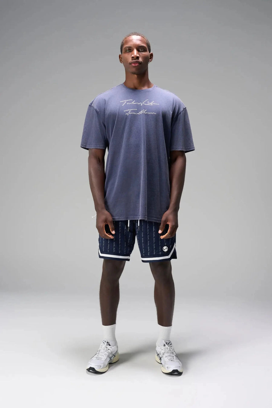 Front View of Blue GTS Evolve Mesh 8 Inch Shorts, featuring an 8-inch inseam, custom pinstripe design and zipper pockets