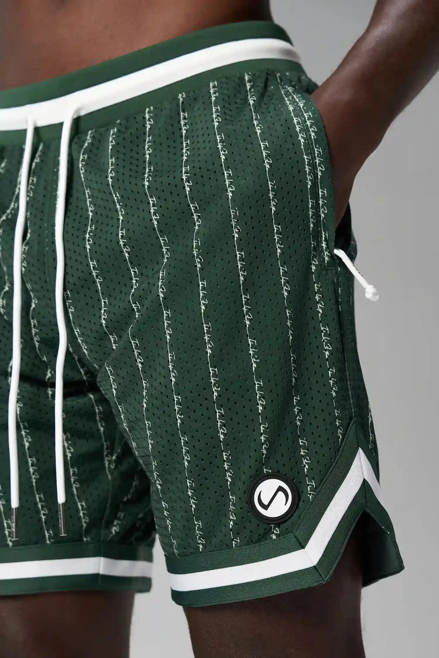 Front View of Green GTS Evolve Mesh 8 Inch Shorts, featuring an 8-inch inseam, custom pinstripe design and zipper pockets