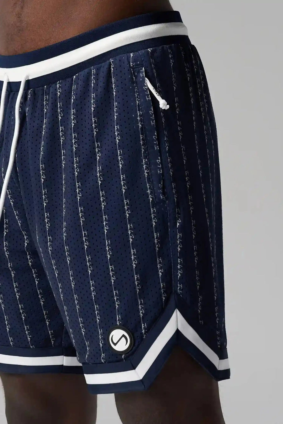 Detail View of Blue GTS Evolve Mesh 8 Inch Shorts, featuring an 8-inch inseam, custom pinstripe design and zipper pockets