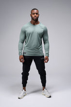 Front View Of the GTS Fitted Henley Long Sleeve in Dark Harvest Green Heather 