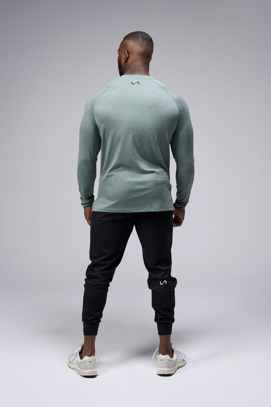 Back View Of the GTS Fitted Henley Long Sleeve in Dark Harvest Green Heather 
