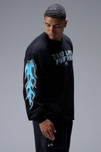 Side View of Black TLF GTS Oversized Heavy Weight Long Sleeve, durable and versatile for gym or street wear 