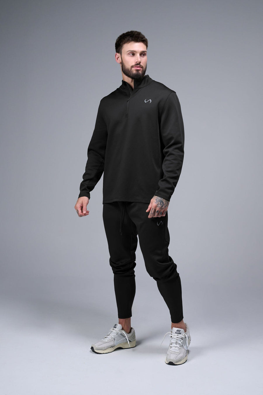 Front View of Black TLF Quad Tech Joggers  featuring a fusion of performance, comfort, and style for the ultimate in mens jogger pants