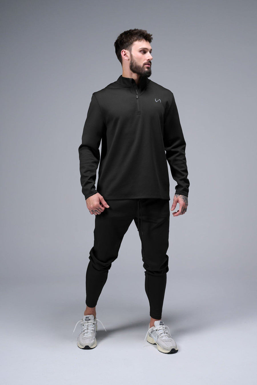 Front View of Black TLF Quad Tech Joggers  featuring a fusion of performance, comfort, and style for the ultimate in mens jogger pants