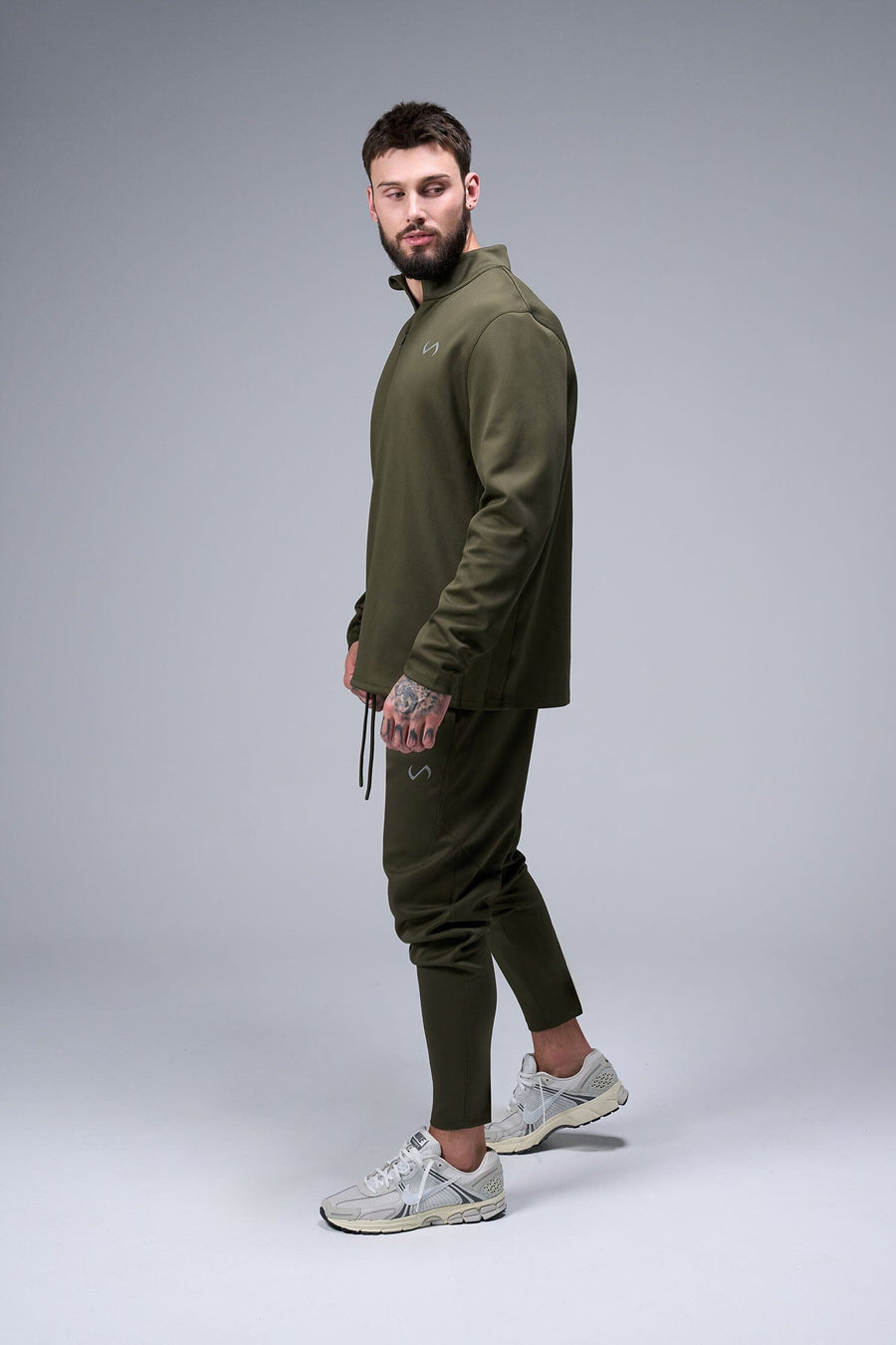 Back View of Marshland TLF GTS Quad Tech Quarter-Zip Pullover redefining modern activewear, this men’s 1/4 zip pullover blends technology with sleek style 