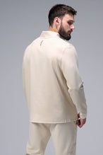 Back View of Oat Milk TLF GTS Quad Tech Quarter-Zip Pullover redefining modern activewear, this men’s 1/4 zip pullover blends technology with sleek style 