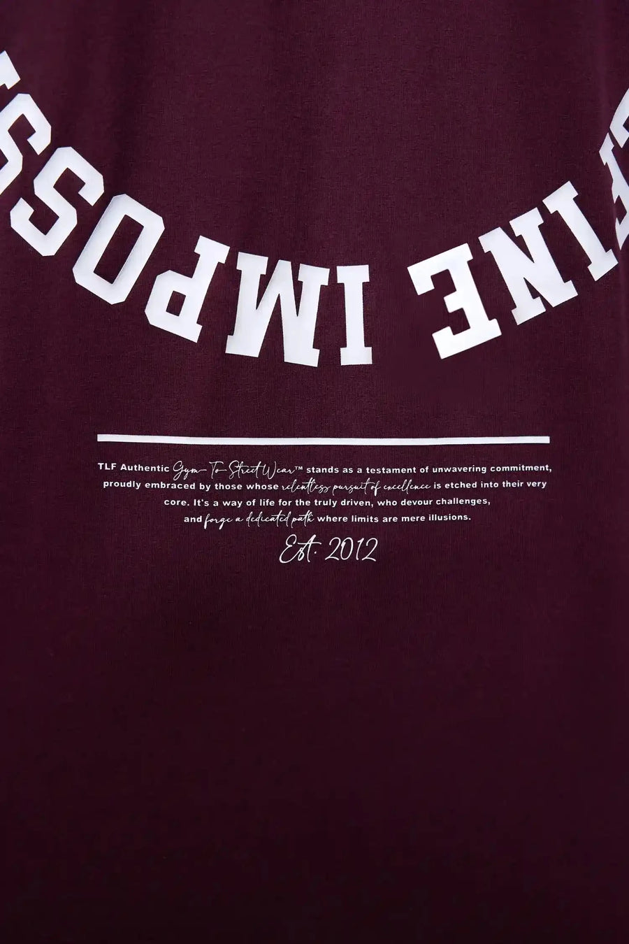 Detail View of Red the TLF Redefine Original Cotton Luxe Oversized LS Tee that features a bold back graphic in an oversized fit. 