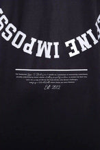 Detail View of Black the TLF Redefine Original Cotton Luxe Oversized LS Tee that features a bold back graphic in an oversized fit. 