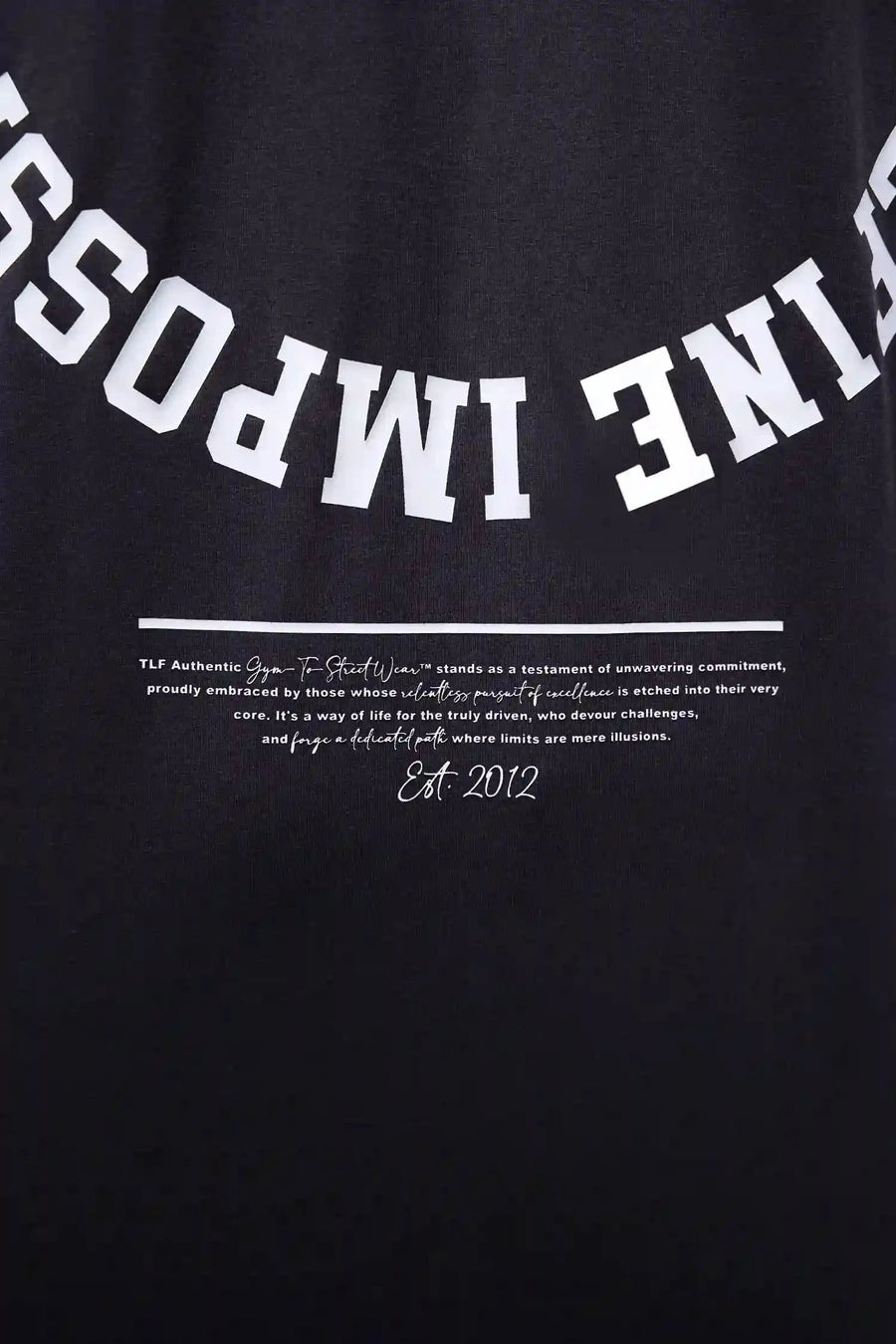 Detail View of Black the TLF Redefine Original Cotton Luxe Oversized LS Tee that features a bold back graphic in an oversized fit. 