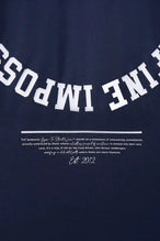 Detail View of Blue the TLF Redefine Original Cotton Luxe Oversized LS Tee that features a bold back graphic in an oversized fit. 