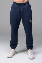 Front View of Blue TLF GTS Scuba Tech Joggers, featuring an athletic relaxed fit with zipper pockets