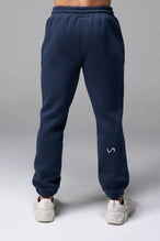 Front View of Blue TLF GTS Scuba Tech Joggers, featuring an athletic relaxed fit with zipper pockets