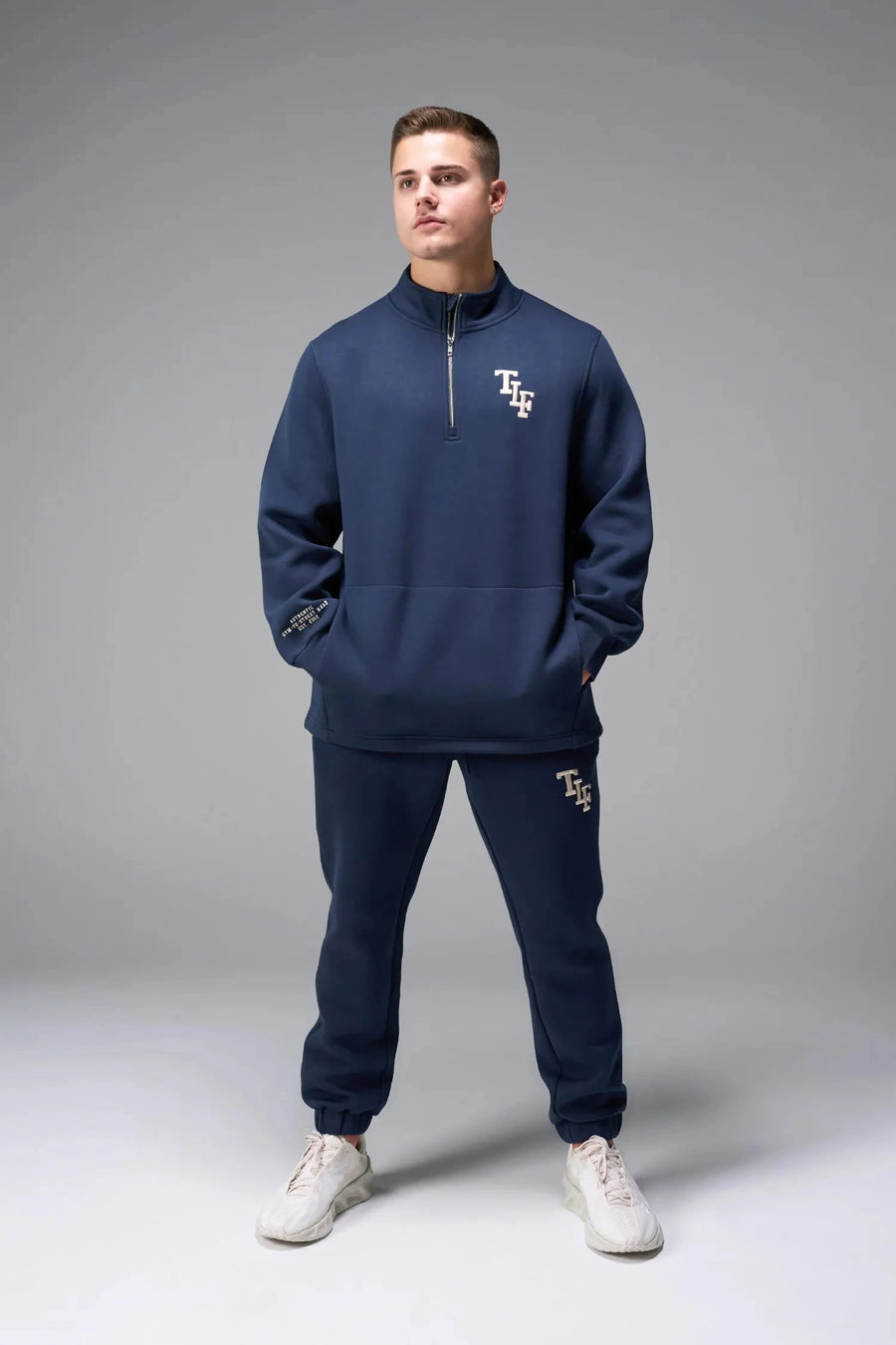 Front View of Blue TLF GTS Scuba Tech Joggers, featuring an athletic relaxed fit with zipper pockets
