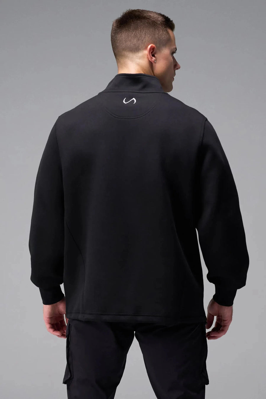 Front View of Black  TLF GTS Scuba Tech Quarter-Zip Pullover, featuring a ¼ zip pullover, sleek design and kangaroo pockets 