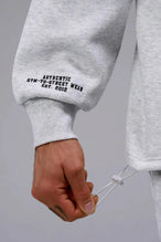 Front View of Gray  TLF GTS Scuba Tech Quarter-Zip Pullover, featuring a ¼ zip pullover, sleek design and kangaroo pockets 