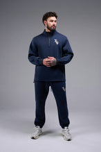 Front View of Blue Nights TLF GTS Scuba Tech Quarter-Zip Pullover, featuring a ¼ zip pullover, sleek design and kangaroo pockets