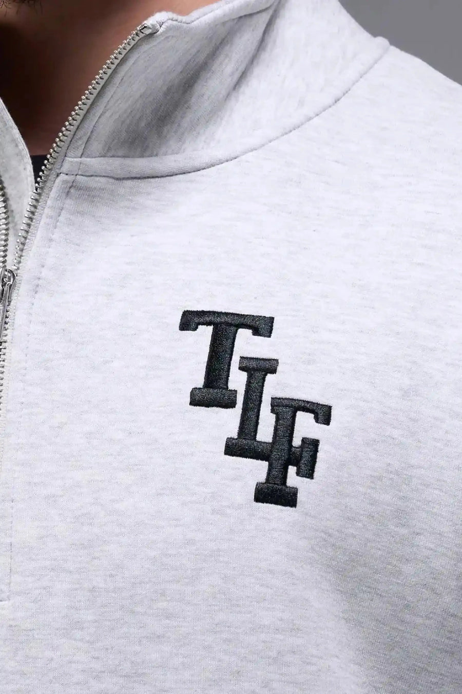 Front View of Gray  TLF GTS Scuba Tech Quarter-Zip Pullover, featuring a ¼ zip pullover, sleek design and kangaroo pockets 