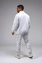 Front View of Gray  TLF GTS Scuba Tech Quarter-Zip Pullover, featuring a ¼ zip pullover, sleek design and kangaroo pockets 
