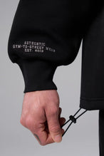 Front View of Black  TLF GTS Scuba Tech Quarter-Zip Pullover, featuring a ¼ zip pullover, sleek design and kangaroo pockets 