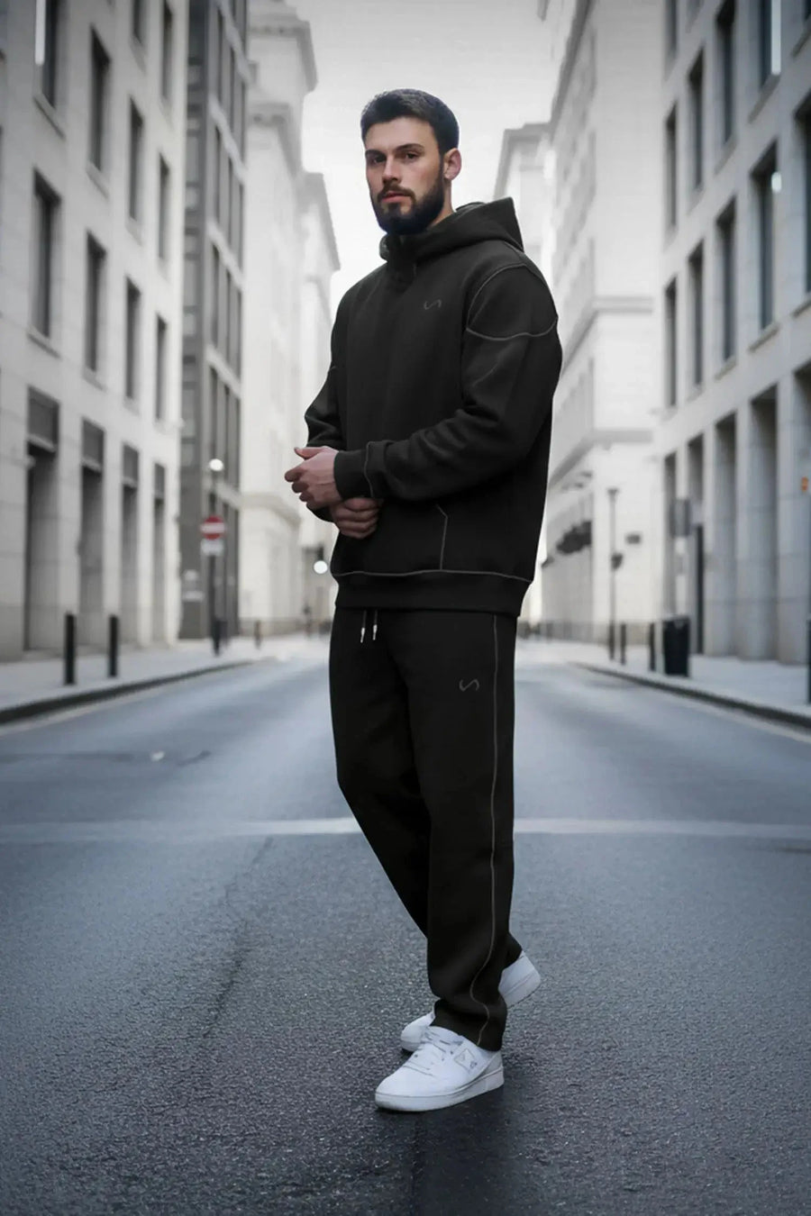 Front View of Black TLF GTS Twill Tech Joggers, featuring contrast stitching, zippered pockets, and next level style and function