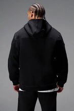 Back View of Black TLF GTS Twill Tech Quarter-Zip Hoodie, featuring contrast stitching, kangaroo pockets and unmatched style