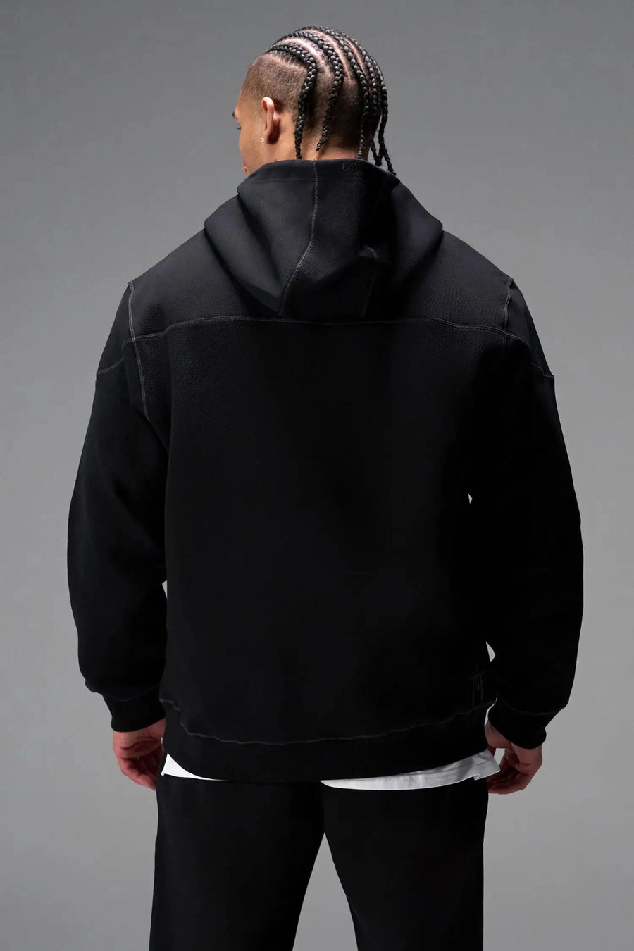 Back View of Black TLF GTS Twill Tech Quarter-Zip Hoodie, featuring contrast stitching, kangaroo pockets and unmatched style