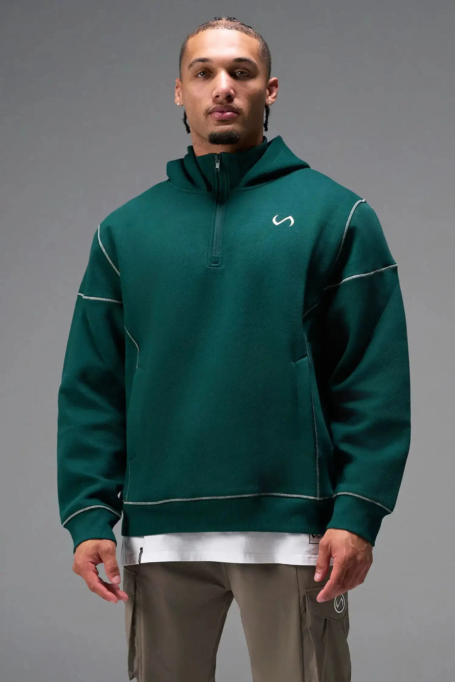 Front View of Green TLF GTS Twill Tech Quarter-Zip Hoodie, featuring contrast stitching, kangaroo pockets and unmatched style