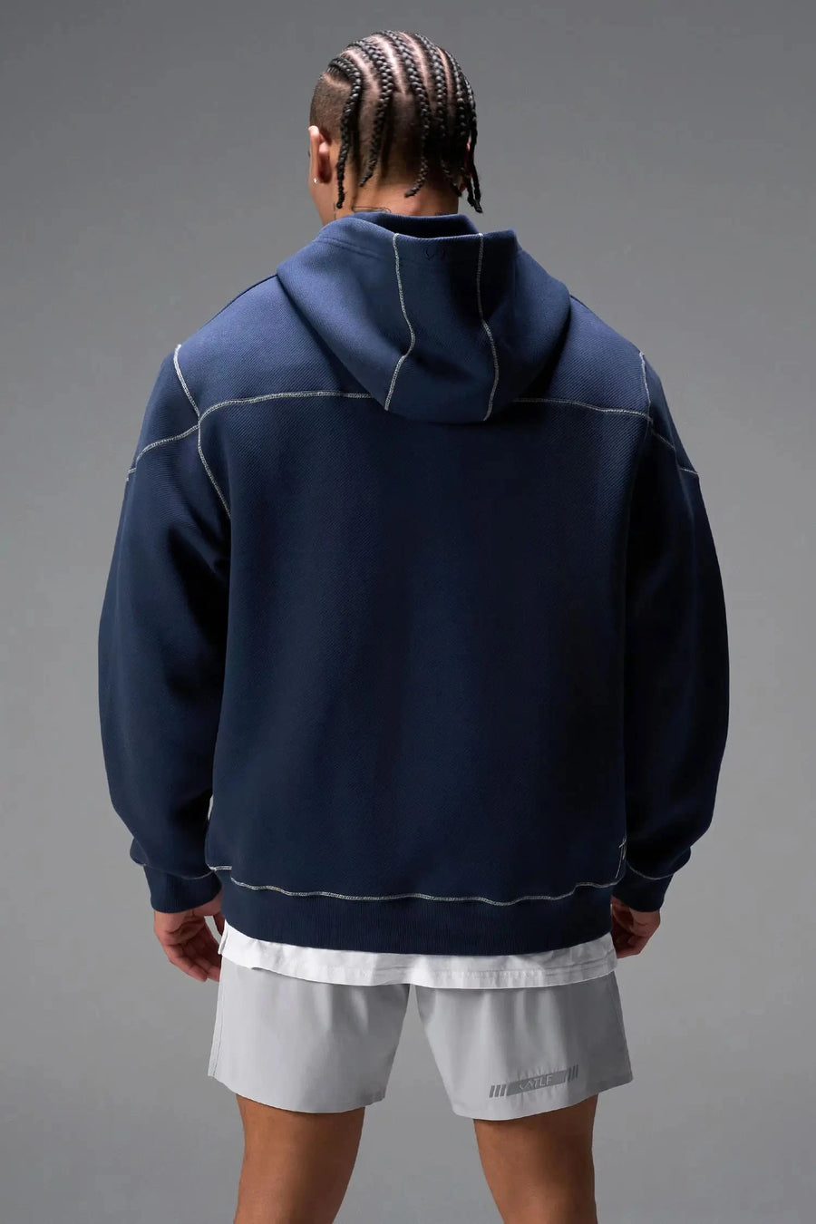 Back View of Blue TLF GTS Twill Tech Quarter-Zip Hoodie, featuring contrast stitching, kangaroo pockets and unmatched style
