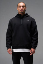 Front View of Black TLF GTS Twill Tech Quarter-Zip Hoodie, featuring contrast stitching, kangaroo pockets and unmatched style
