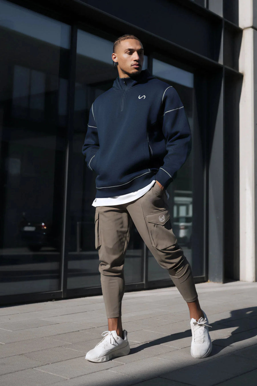 Front View of Blue TLF GTS Twill Tech Quarter-Zip Hoodie, featuring contrast stitching, kangaroo pockets and unmatched style