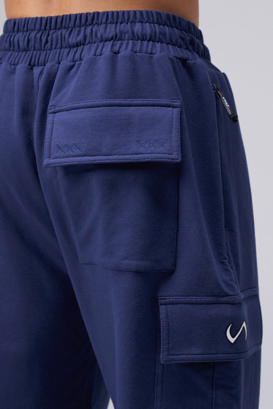 Back View Of Men's GTS Vital Terry Cargo Joggers in Navy Blue