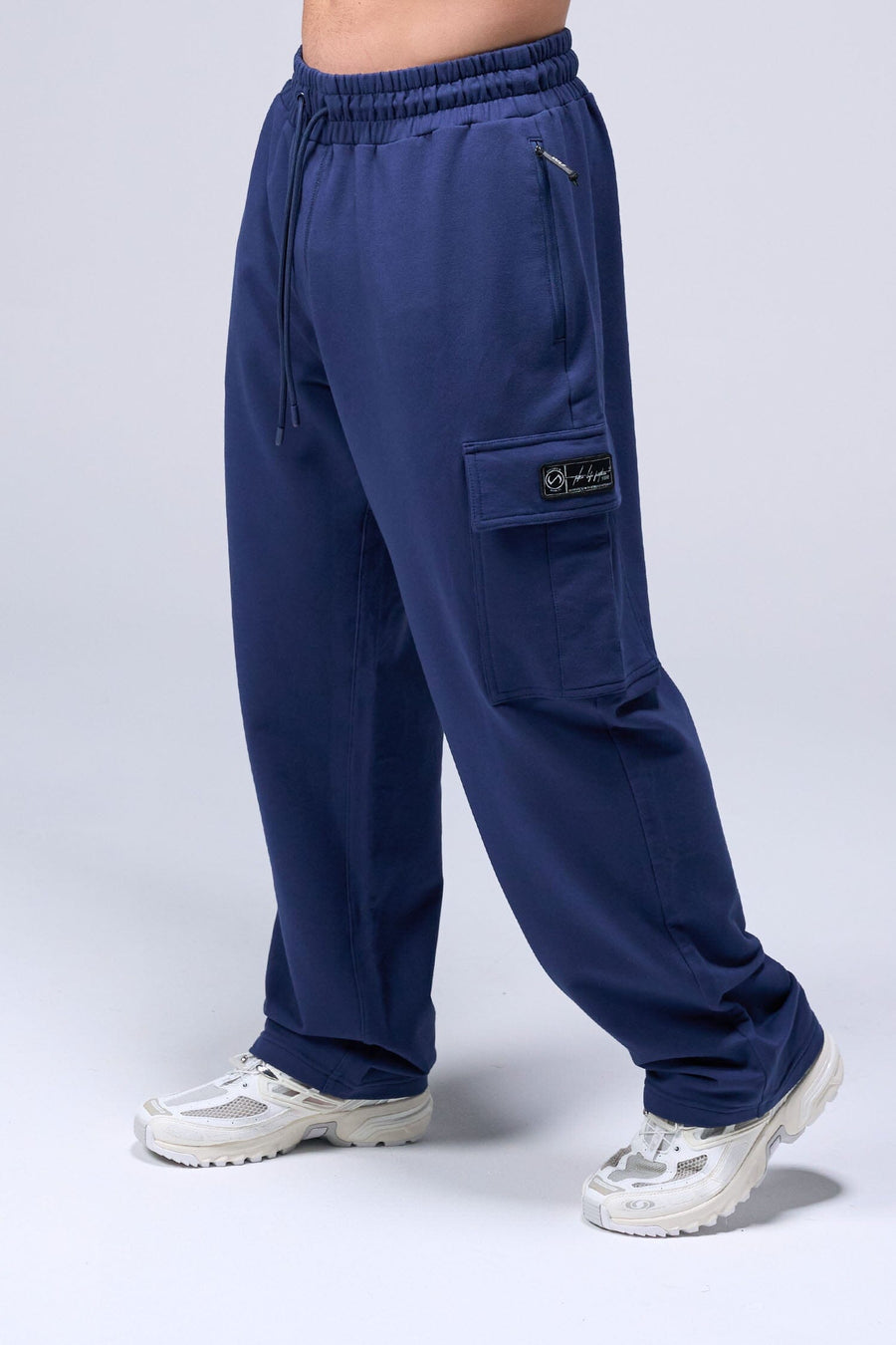 Left Side View Of Men's GTS Vital Terry Cargo Joggers in Navy Blue