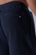 Front View of Blue TLF GTS Waffle Tech Shorts, featuring a 7 Inch inseam, an athletic relaxed fit with zipper pockets designed for all day wear